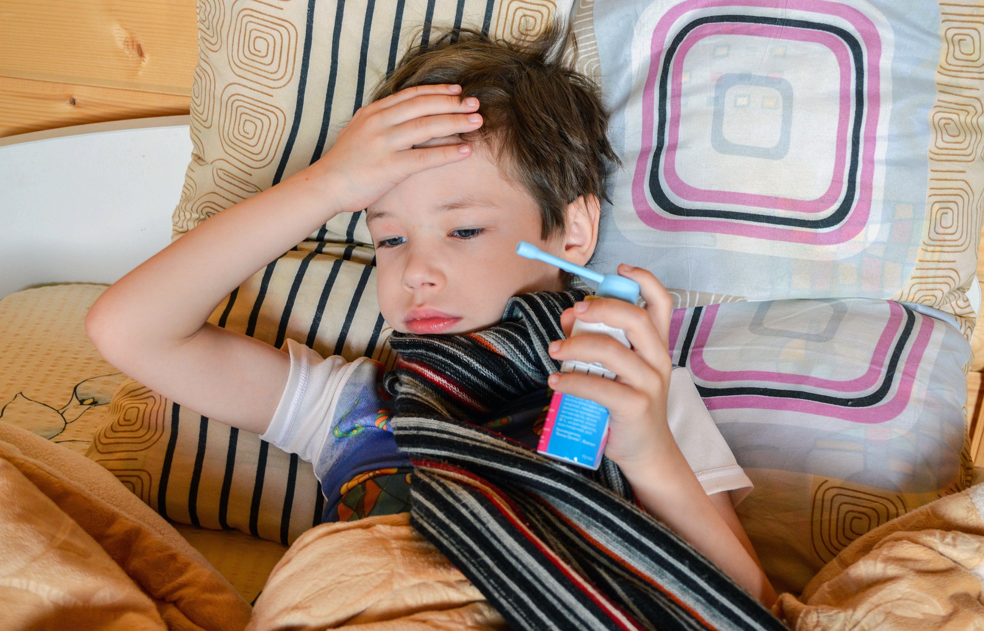Sick child in bed